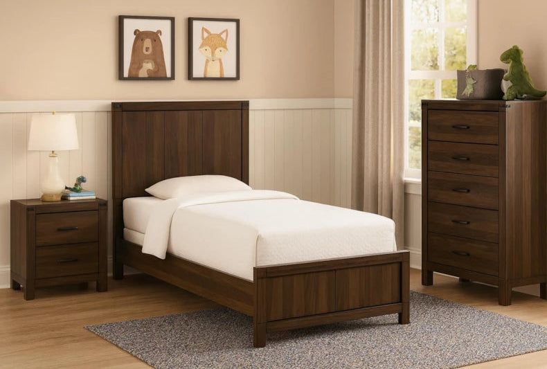 Bedroom with wooden bed, nightstand, and dresser.