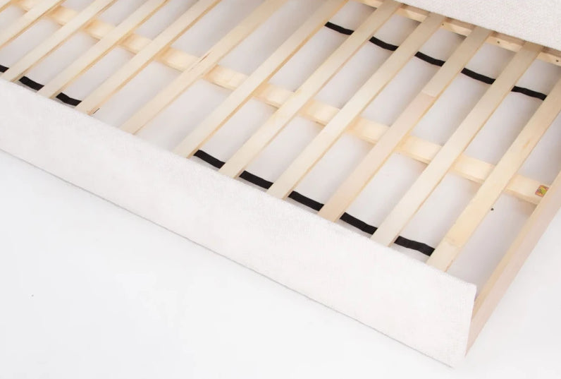 Wooden bed frame on a white background