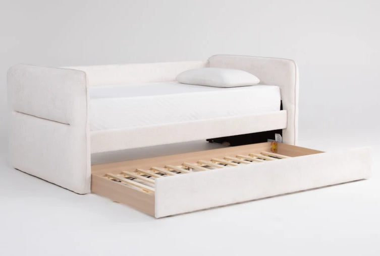 White sofa bed with a wooden drawer on a white background