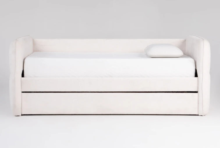 White sofa bed with a mattress on a light gray background