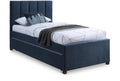 Blue upholstered bed with white bedding and a blanket on a white background