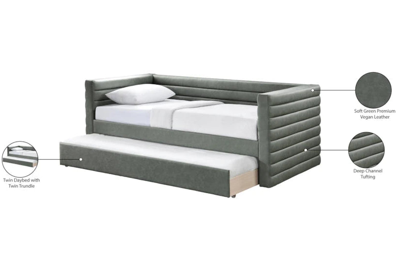 Gray upholstered bed with a trundle on a white background