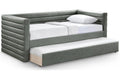 Gray upholstered bed with white mattress and pillow on a white background