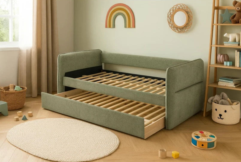 Green upholstered bed with wooden slats in a child-friendly room with toys and decor.
