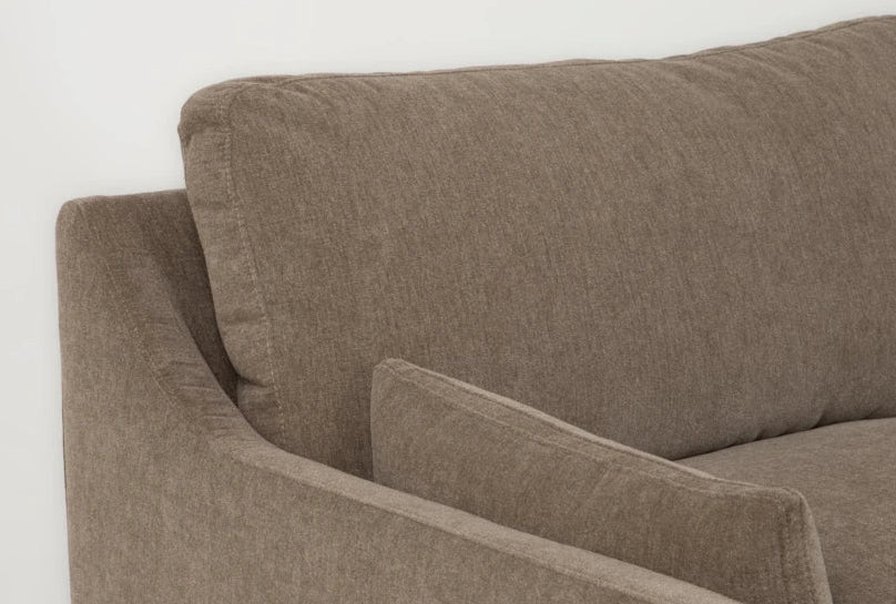 Brown fabric sofa corner on a white background