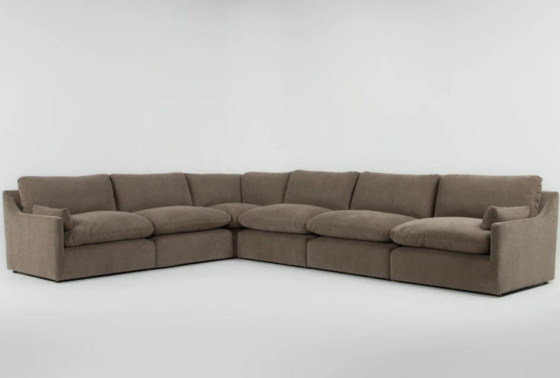 Brown sectional sofa on a white background