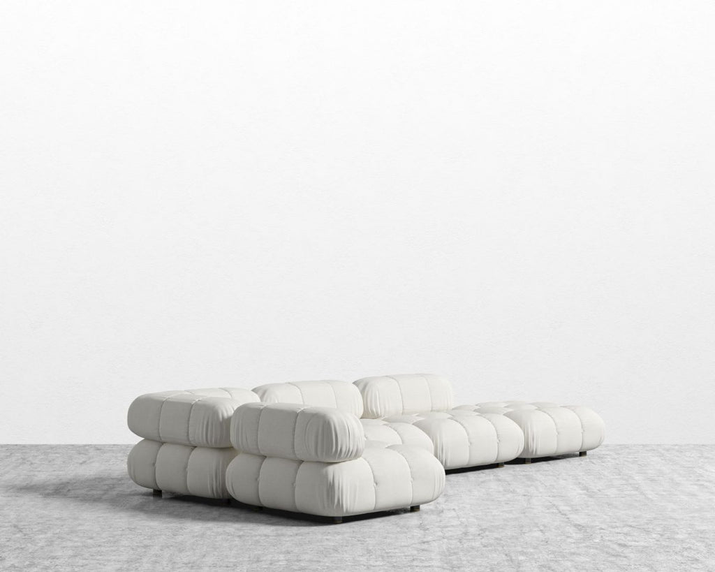 Modern white sofa on a light gray background