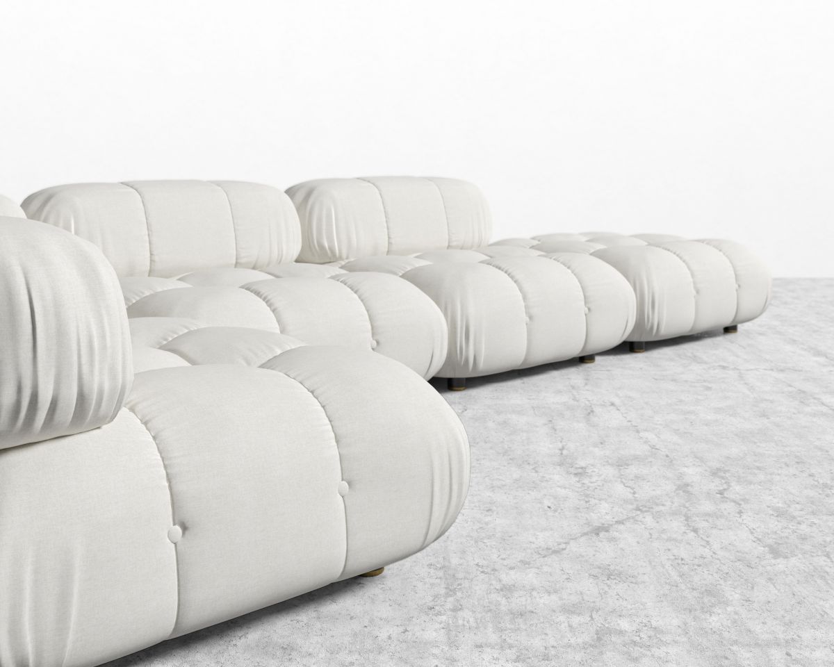 White sofa on a light gray carpet