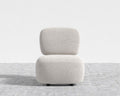 Modern chair with textured design on a light gray background